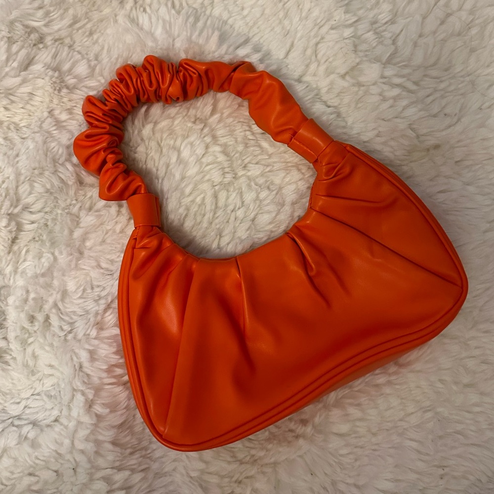Orange purse beach
